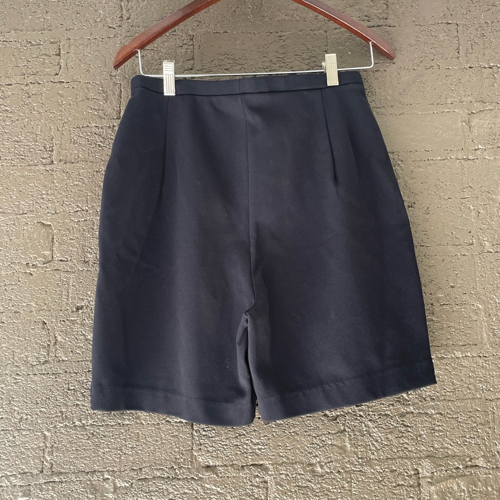 Comfortable black shorts that has an elastic waistband and are very high waisted